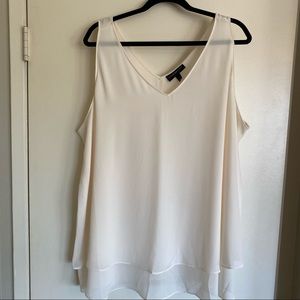 Women’s cream sleeveless top with tiered bottom